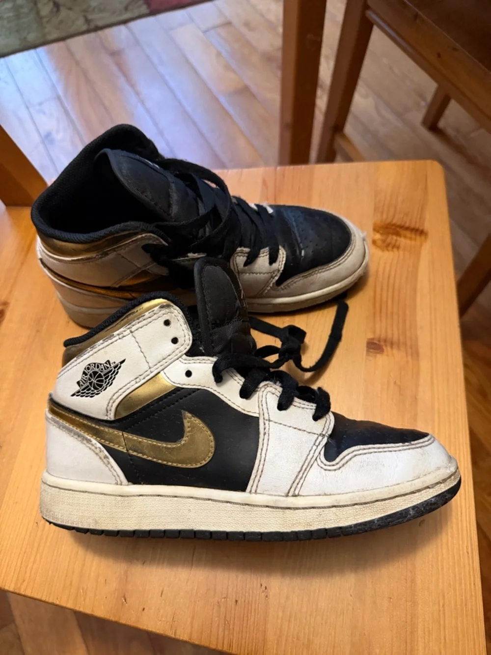 Boys Nike Black White Gold Jordan 1 Mid Sneakers